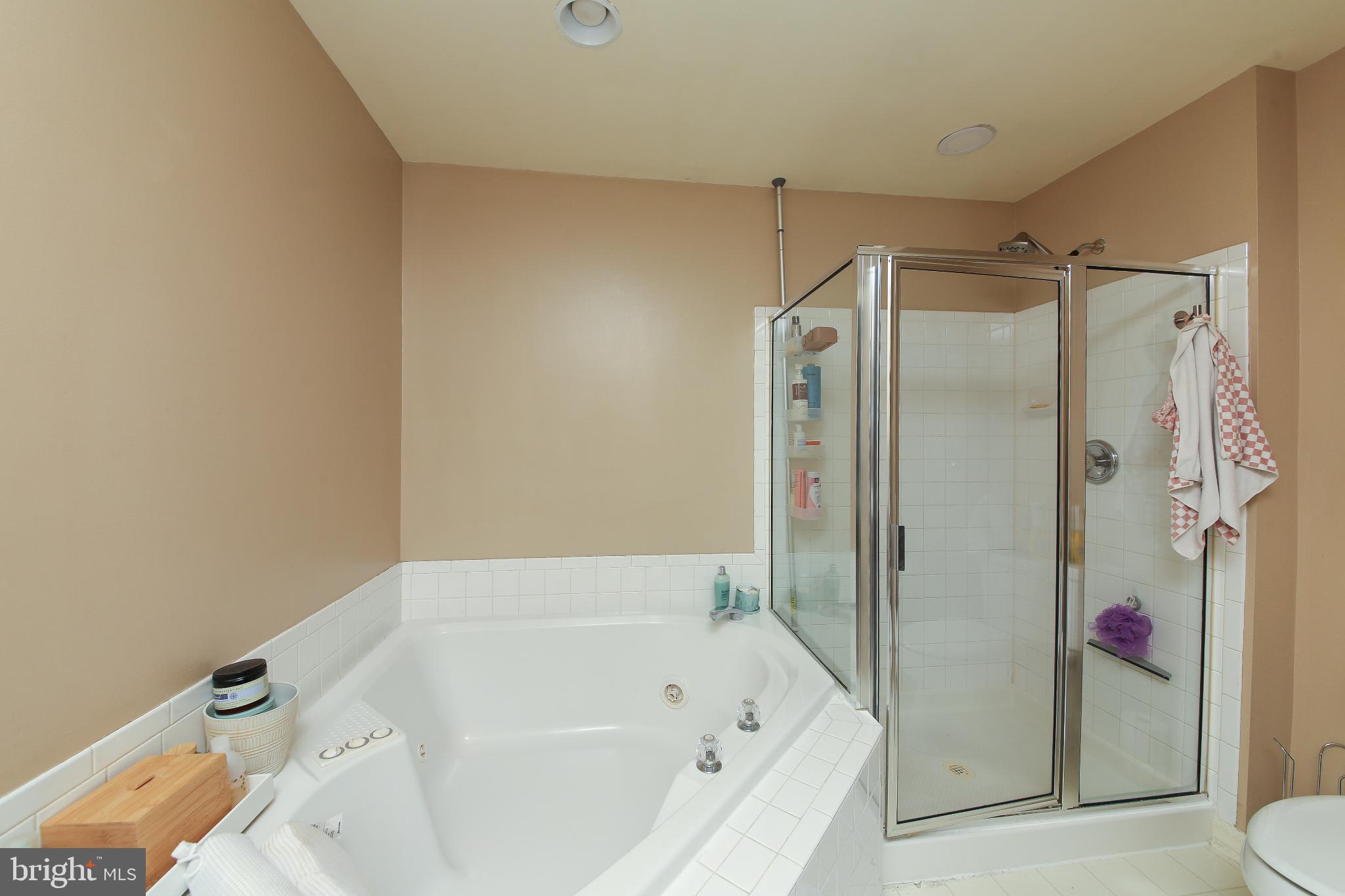 535 Mockingbird Way Warrington, PA 18976 - Photo 14 of 27 a bathroom with a bathtub and a shower