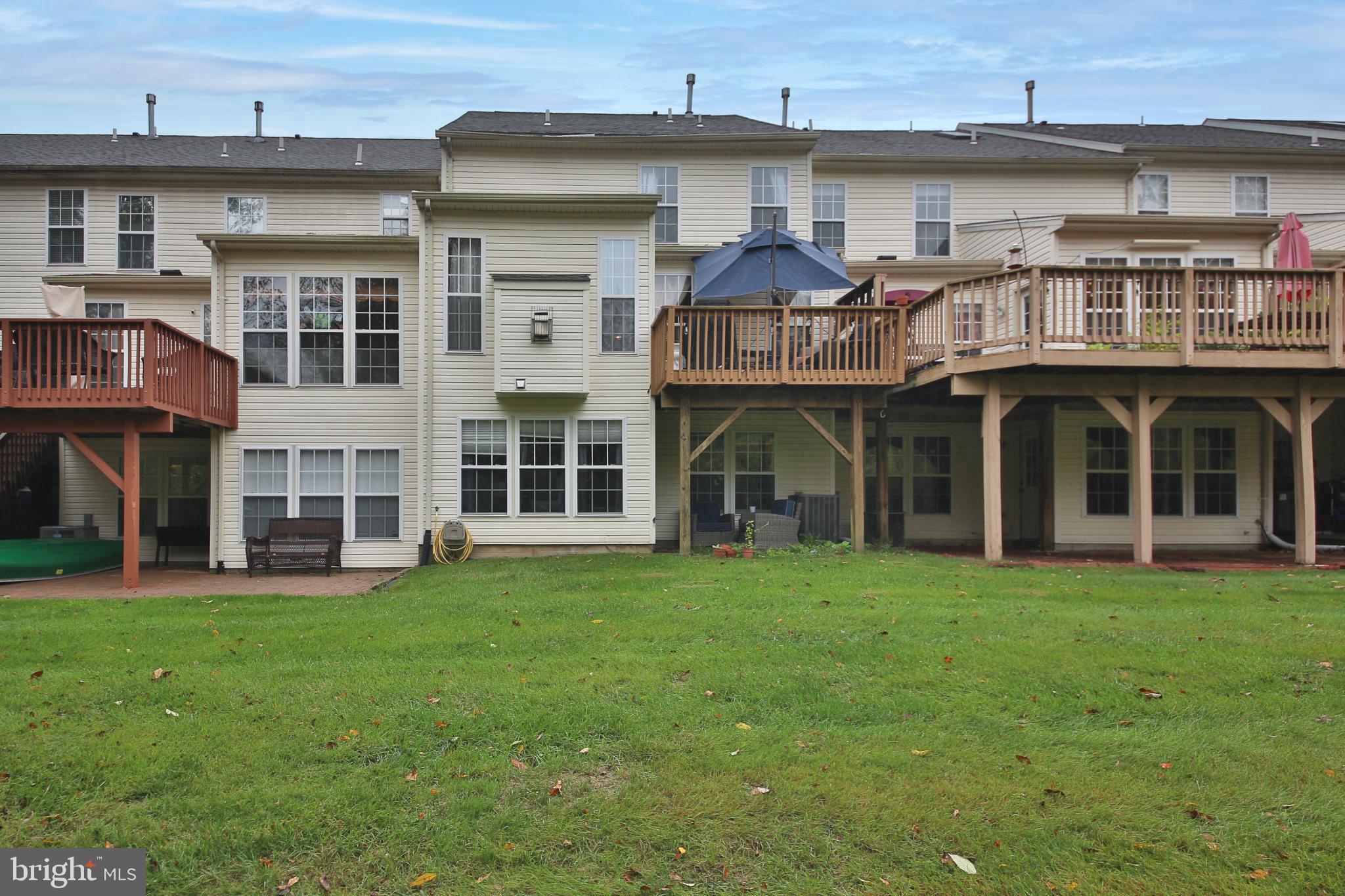 535 Mockingbird Way Warrington, PA 18976 - Photo 26 of 27 a front view of a building with a garden