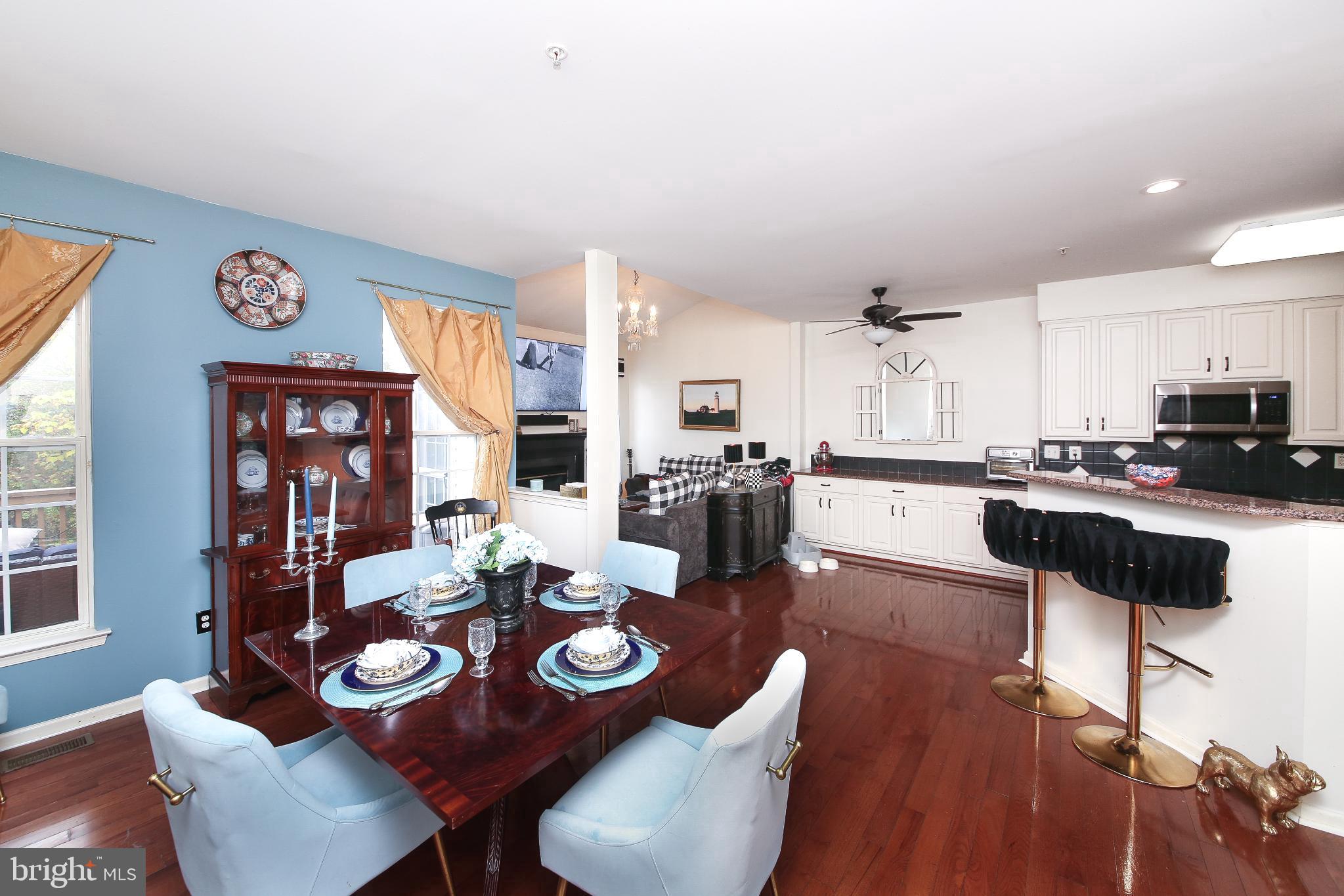 535 Mockingbird Way Warrington, PA 18976 - Photo 3 of 27 a open dining room with furniture and wooden floor