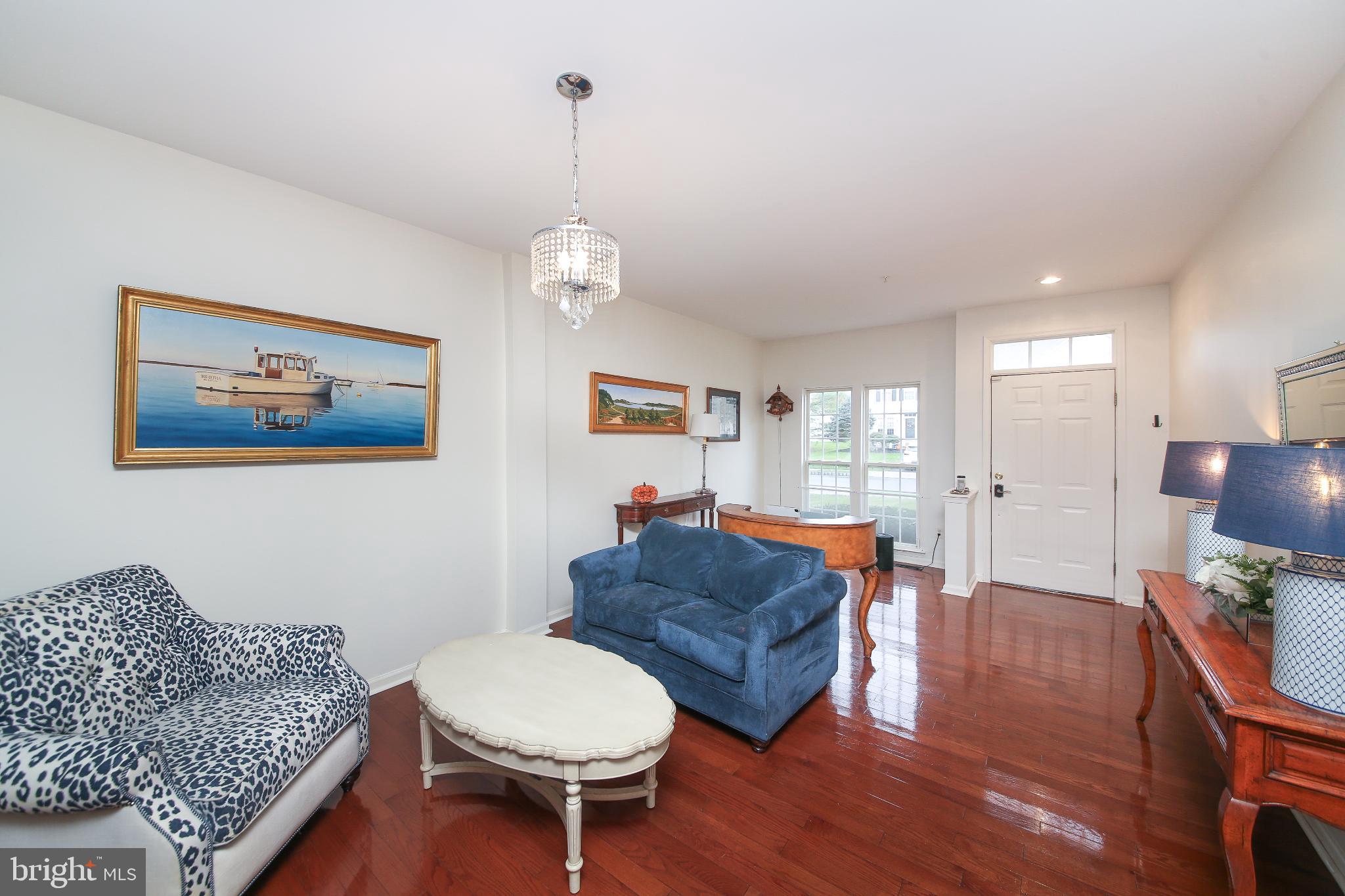 535 Mockingbird Way Warrington, PA 18976 - Photo 8 of 27 a living room with furniture and a wooden floor