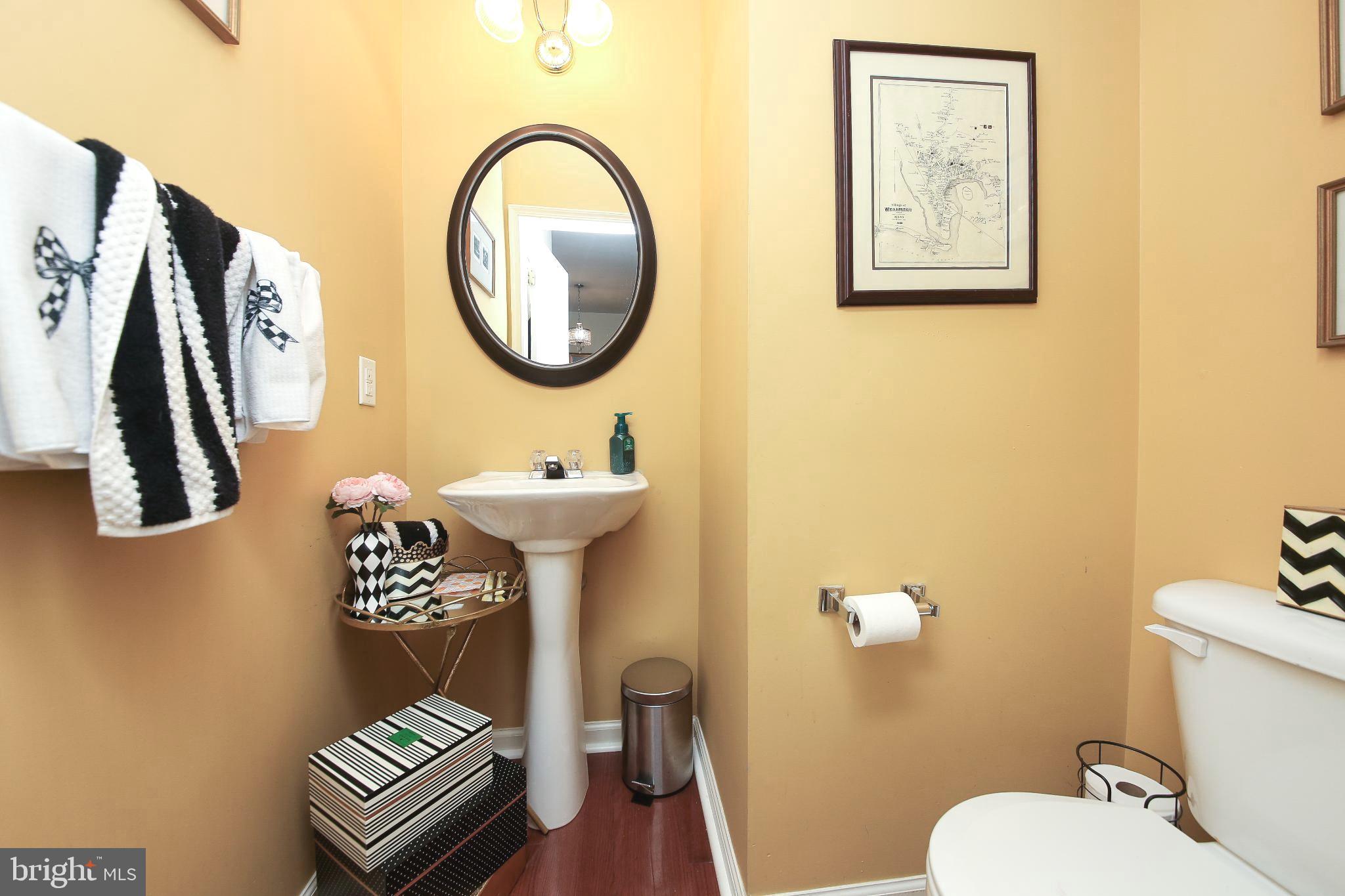 535 Mockingbird Way Warrington, PA 18976 - Photo 10 of 27 a bathroom with a toilet a sink and a mirror
