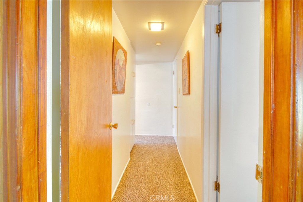 1215 Lark Road Wrightwood, CA 92397 - Photo 11 of 34 a view of a bathroom with a shower curtain
