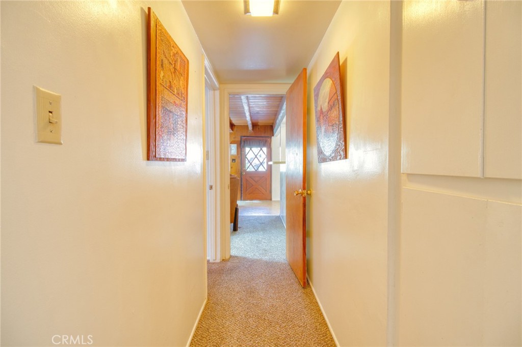1215 Lark Road Wrightwood, CA 92397 - Photo 15 of 34 a view of hallway with a large mirror