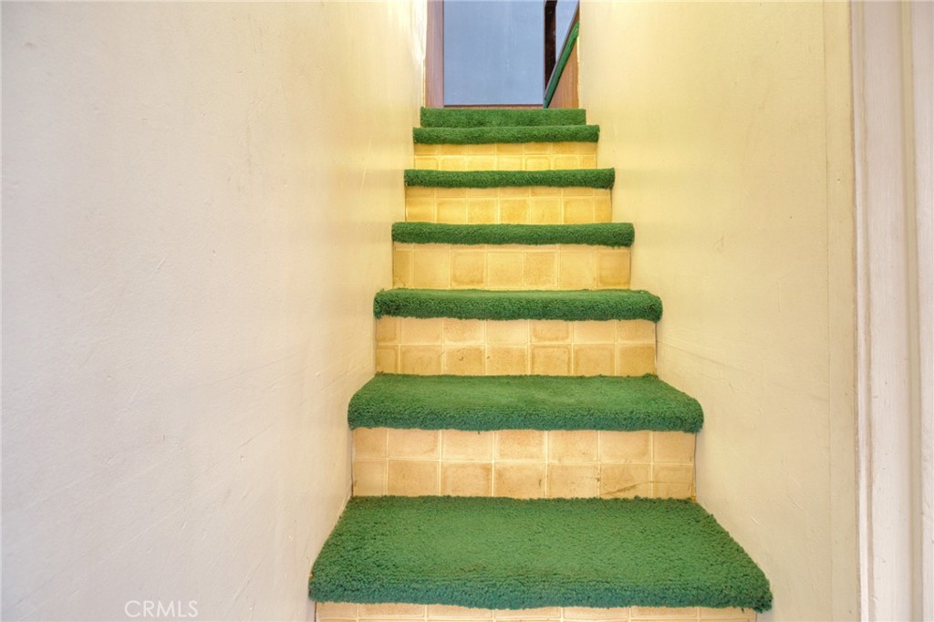 1215 Lark Road Wrightwood, CA 92397 - Photo 17 of 34 a room with a bench and a yard