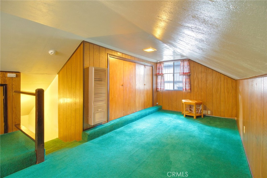 1215 Lark Road Wrightwood, CA 92397 - Photo 22 of 34 a view of an empty room with a window