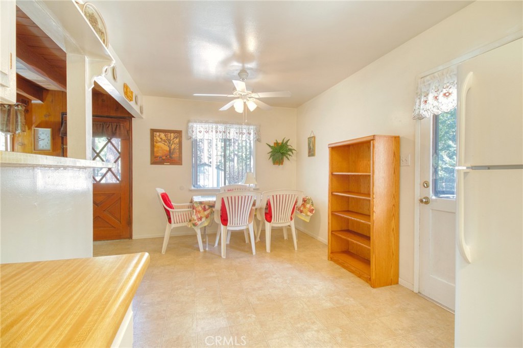 1215 Lark Road Wrightwood, CA 92397 - Photo 9 of 34 a view of a livingroom with furniture and chandelier