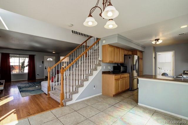 20000 Mitchell Place, Unit 53 Denver, CO 80249 - Photo 14 of 40 a very nice looking room with a large window