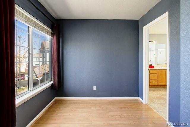 20000 Mitchell Place, Unit 53 Denver, CO 80249 - Photo 19 of 40 a view of an empty room and window