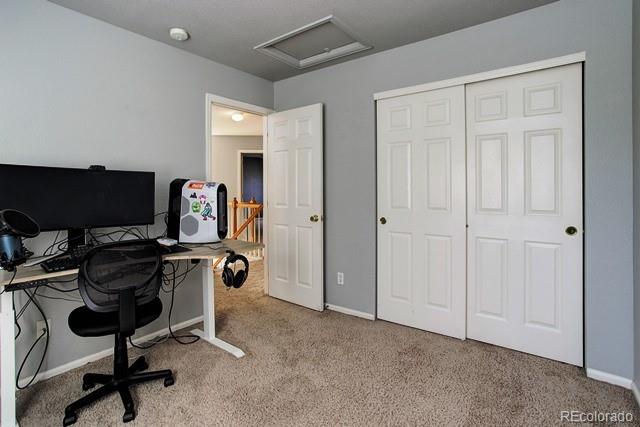 20000 Mitchell Place, Unit 53 Denver, CO 80249 - Photo 23 of 40 a view of a workspace with furniture