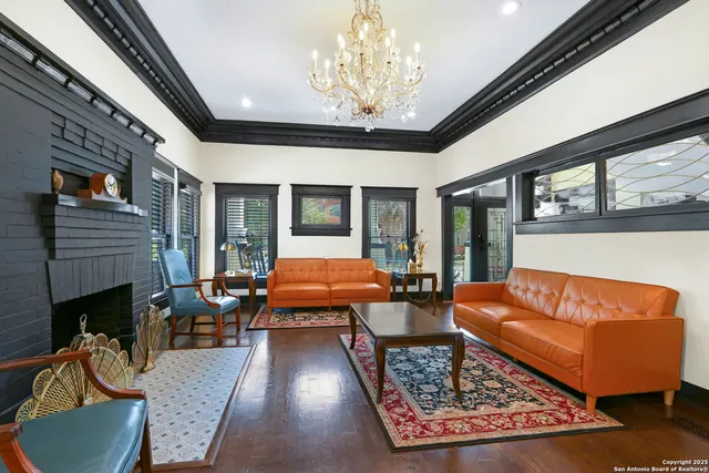 a outdoor living space with furniture and a fireplace