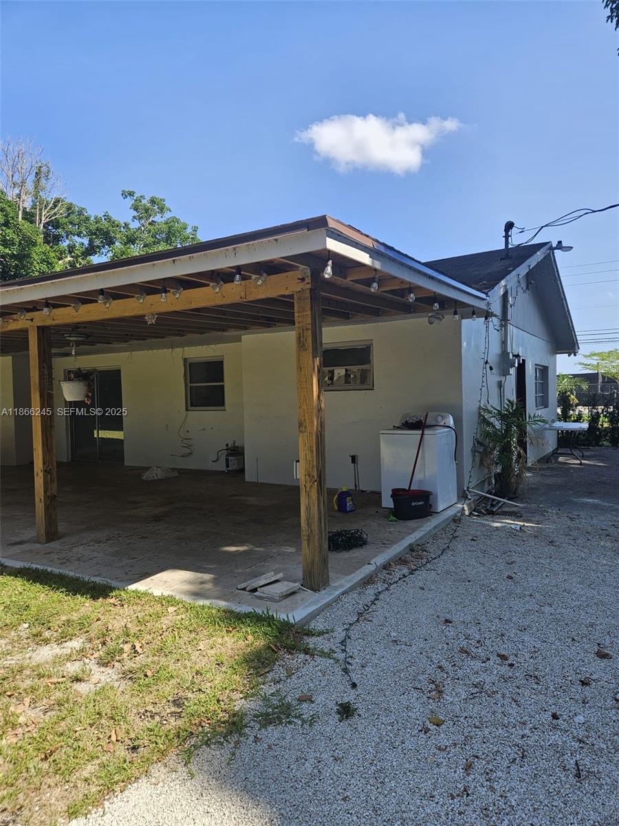 19230 Southwest 216th Street Miami, FL 33170 - Photo 17 of 55 a view of a house with a porch