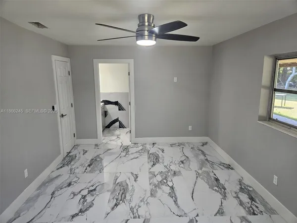 a bathroom with a toilet and a sink