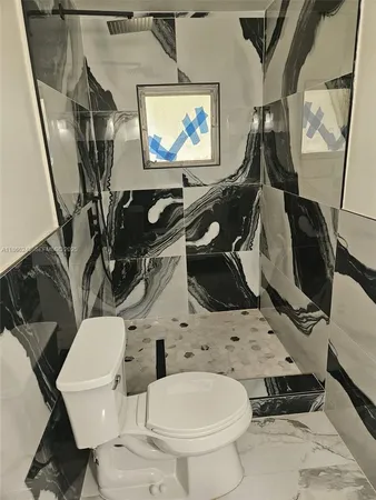 a view of a hallway with a window