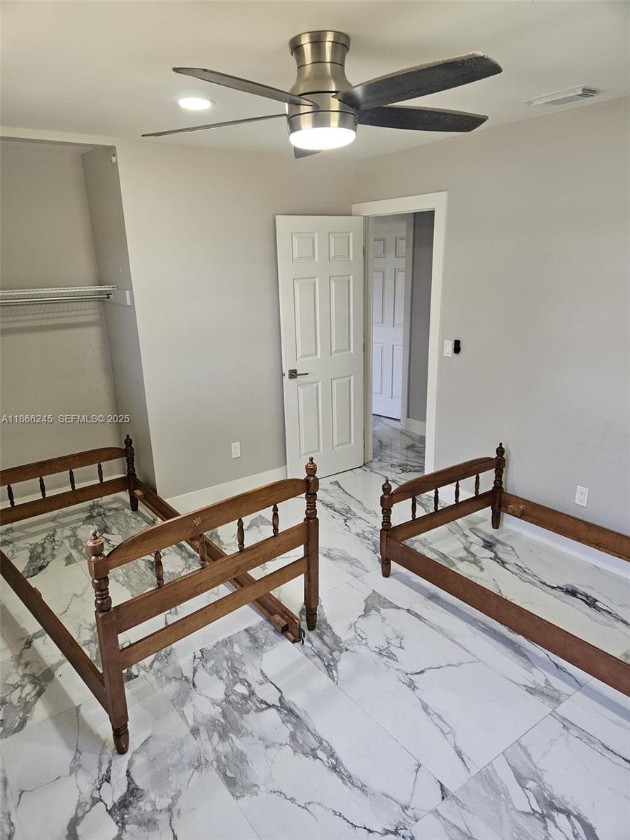 19230 Southwest 216th Street Miami, FL 33170 - Photo 24 of 55 a view of a room with gym equipment