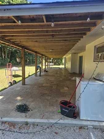 a bedroom with bed and a window