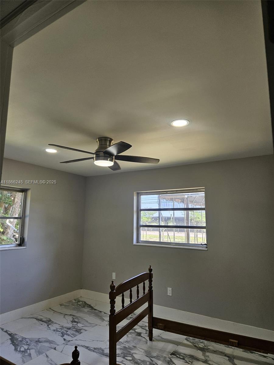 19230 Southwest 216th Street Miami, FL 33170 - Photo 30 of 55 a view of a livingroom with a window