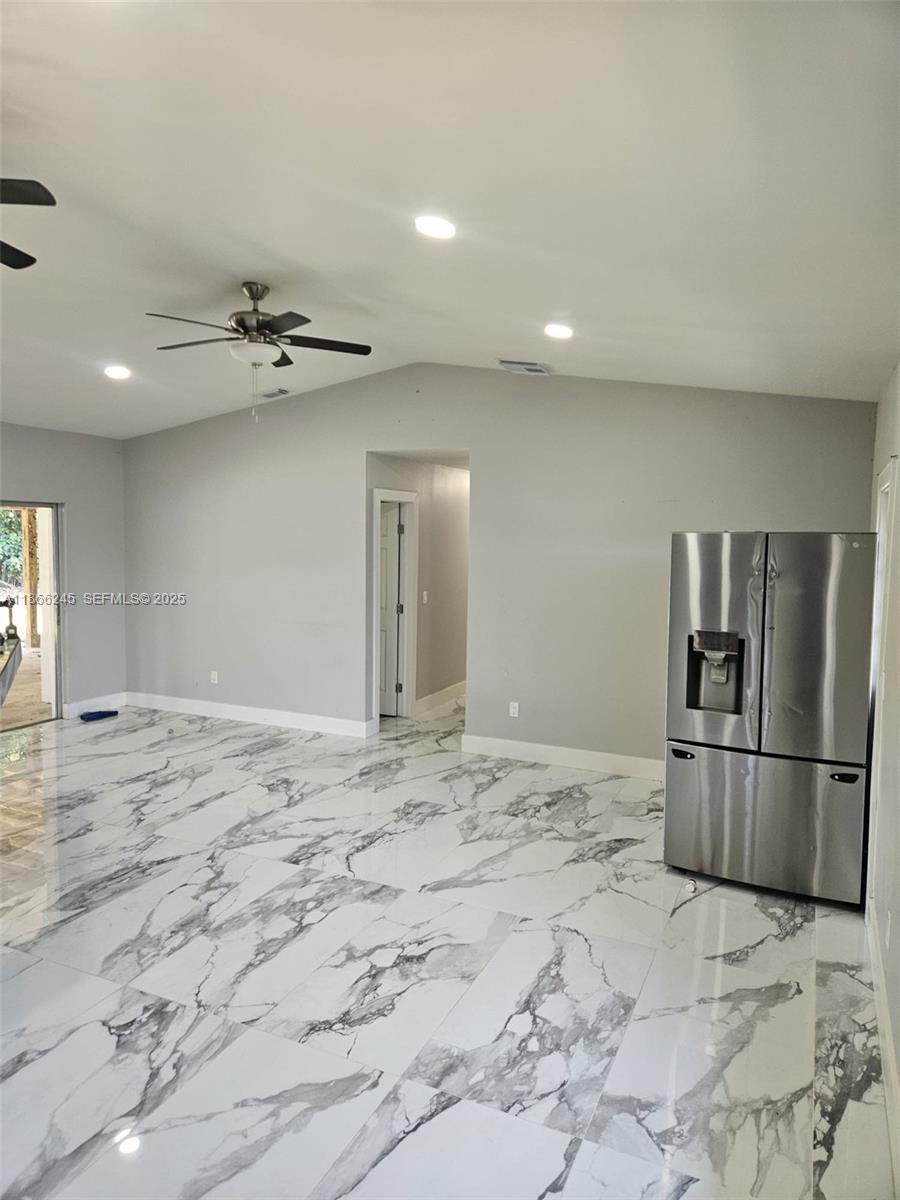 19230 Southwest 216th Street Miami, FL 33170 - Photo 39 of 55 a view of a kitchen with a sink and cabinets