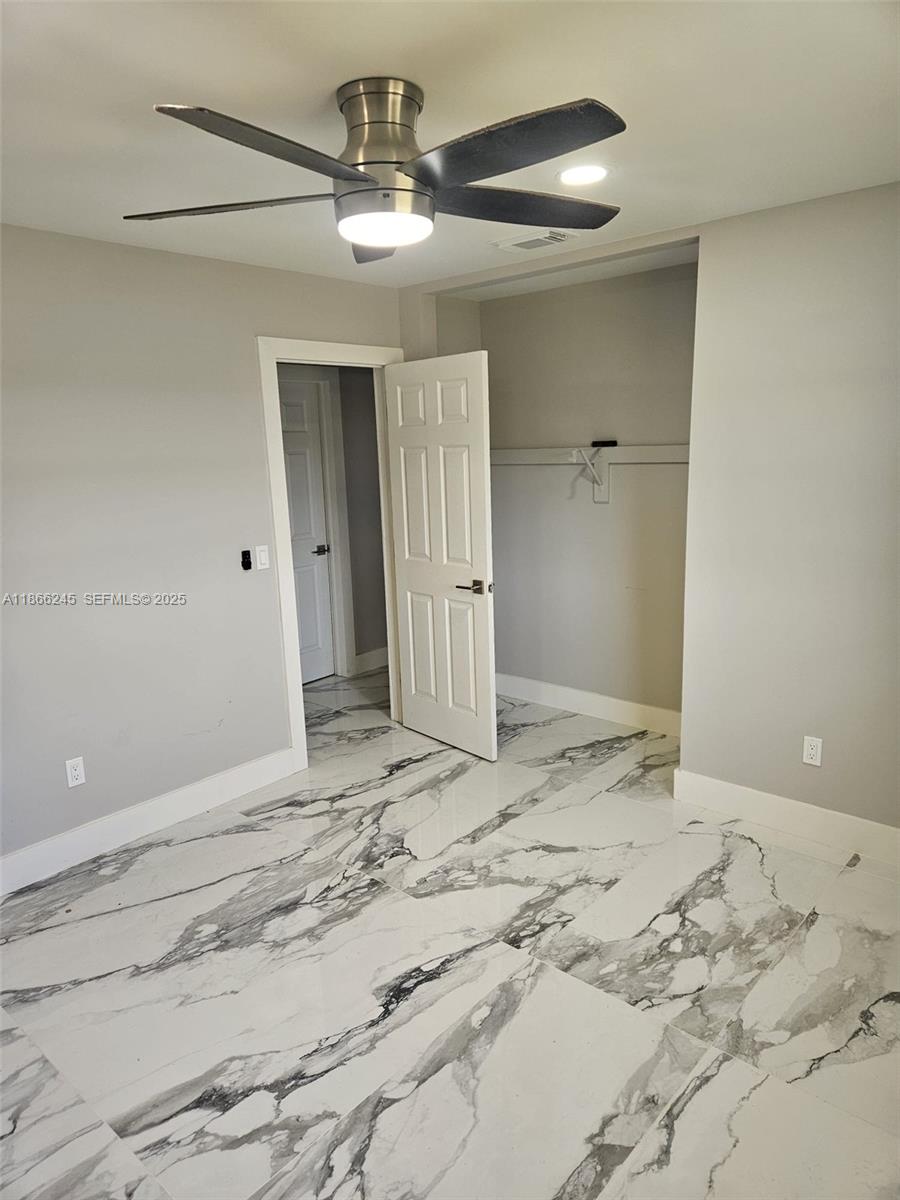 19230 Southwest 216th Street Miami, FL 33170 - Photo 44 of 55 a view of a livingroom with a chandelier