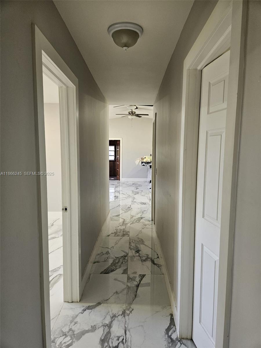 19230 Southwest 216th Street Miami, FL 33170 - Photo 50 of 55 a view of a hallway