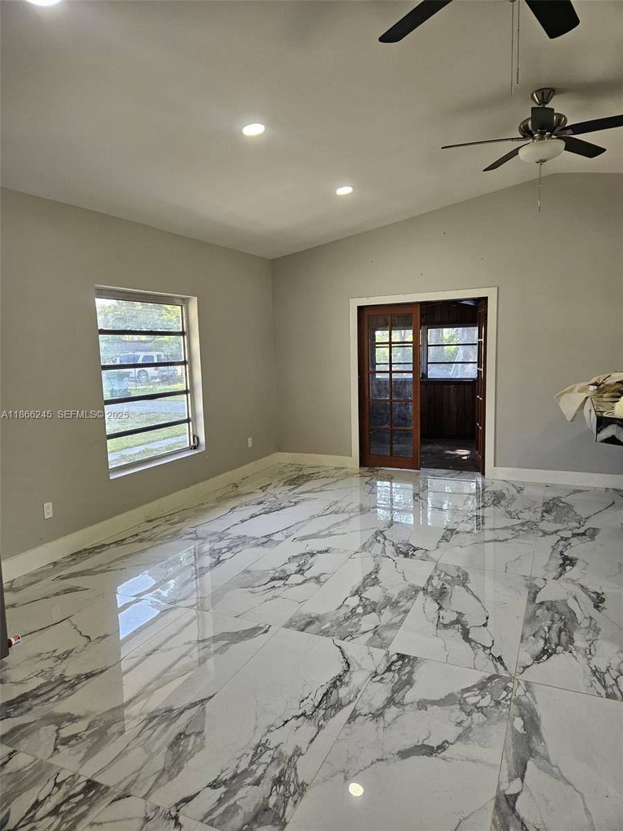 19230 Southwest 216th Street Miami, FL 33170 - Photo 5 of 55 a view of an empty room