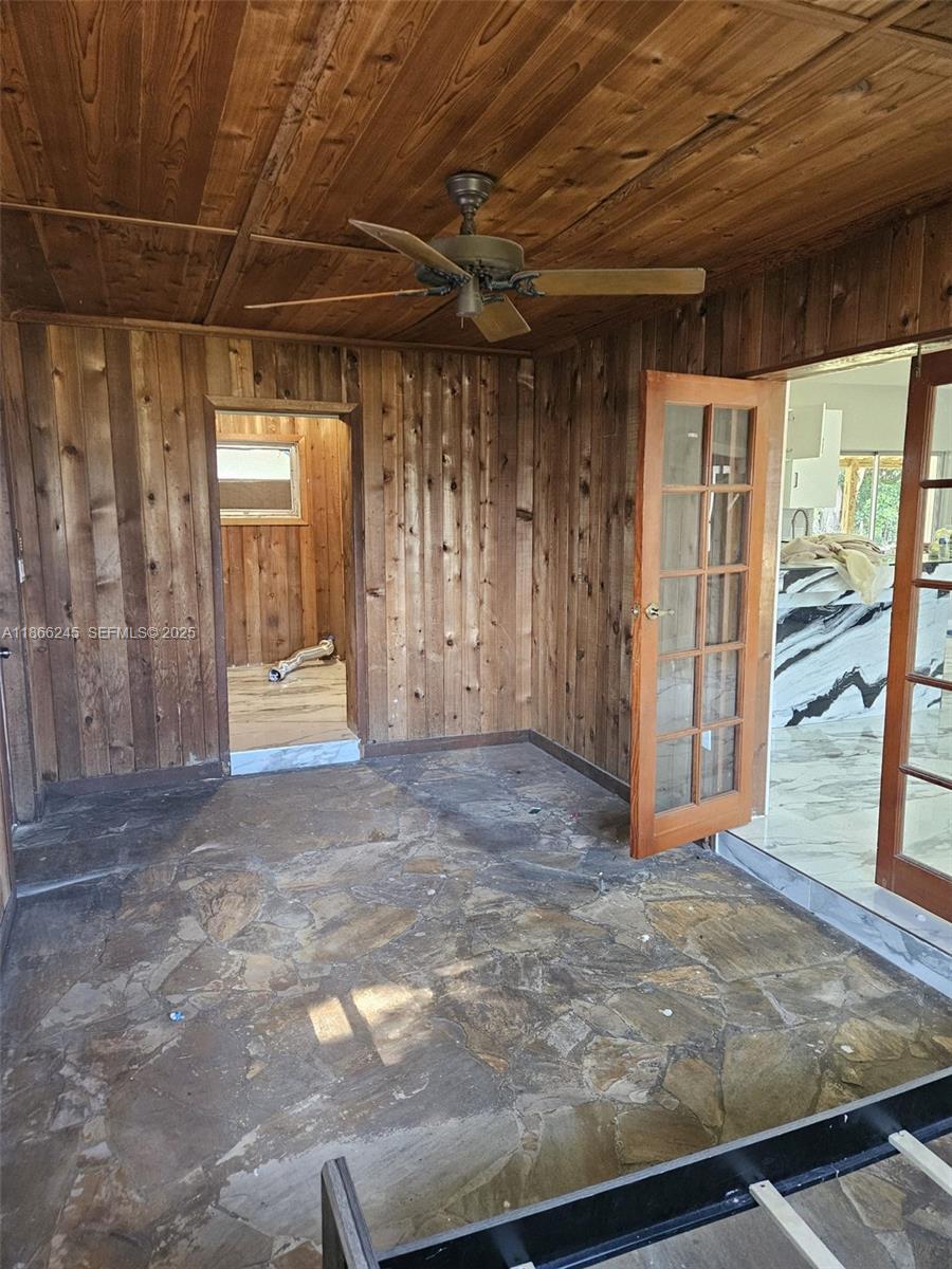 19230 Southwest 216th Street Miami, FL 33170 - Photo 8 of 55 a view of empty room with wooden floor