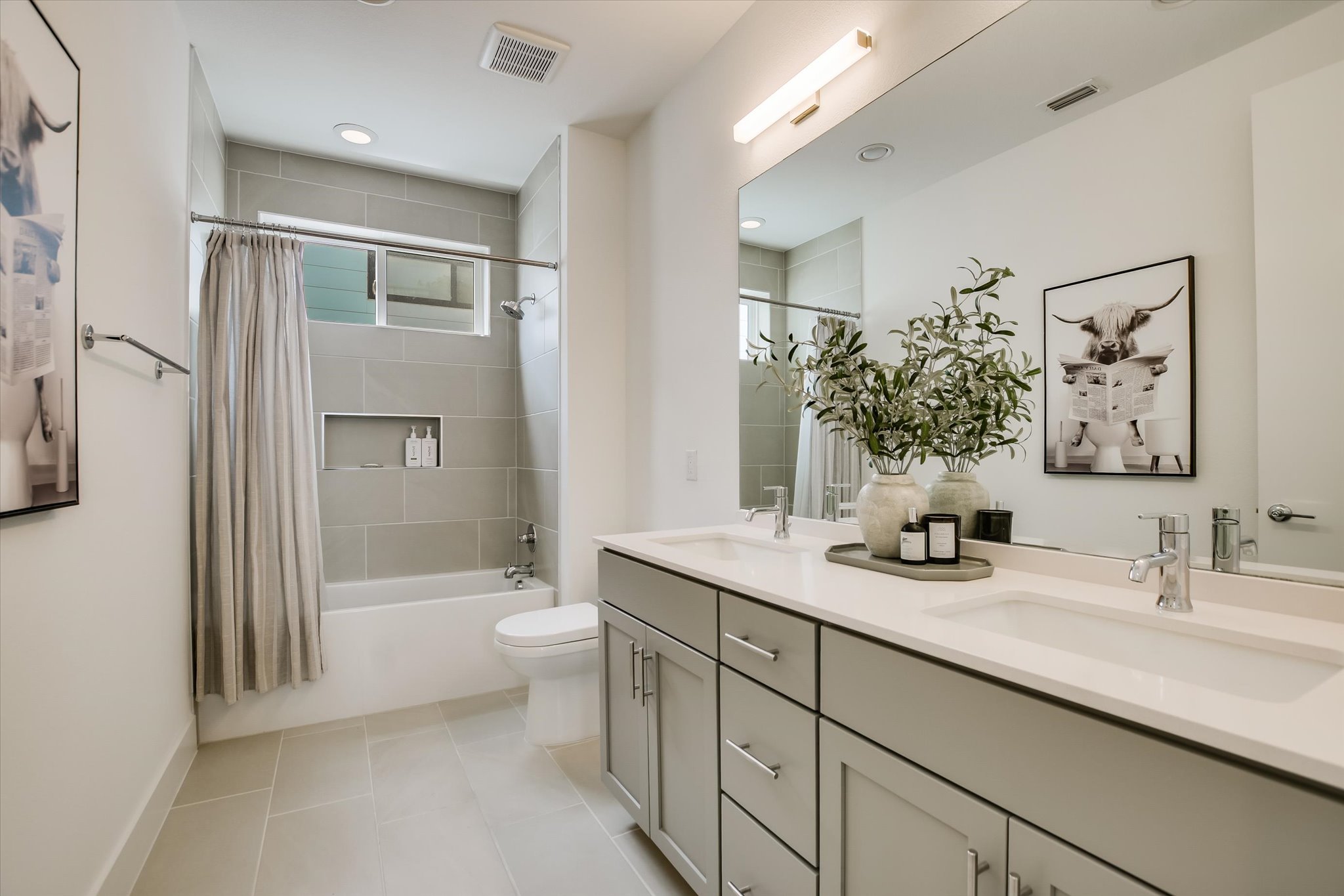 900 South 2nd Street, Unit 6 Austin, TX 78704 - Photo 20 of 25 a bathroom with a double vanity sink toilet and shower
