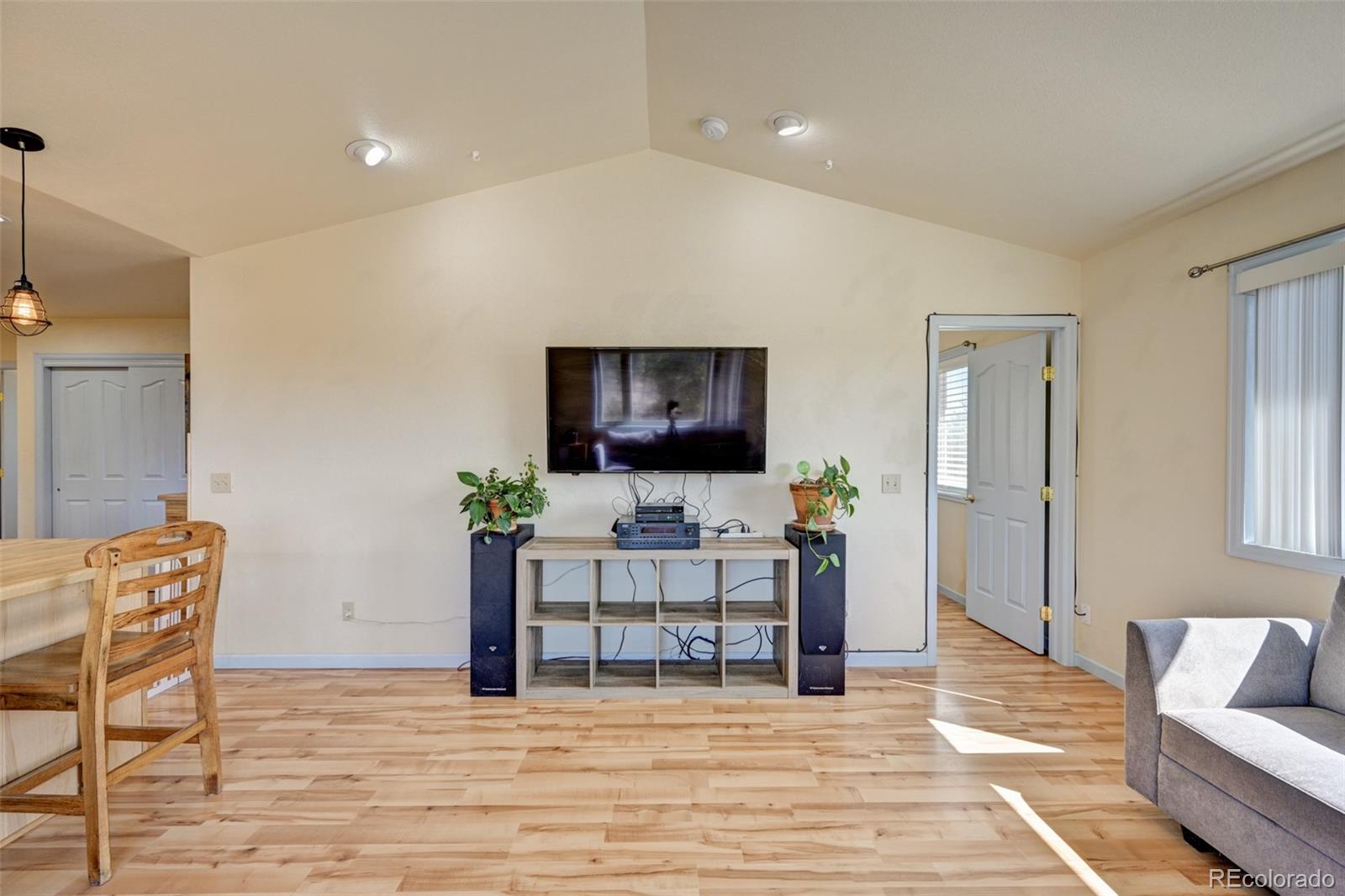 9473 Ranch Road Hartsel, CO 80449 - Photo 4 of 50 a living room with furniture and a flat screen tv