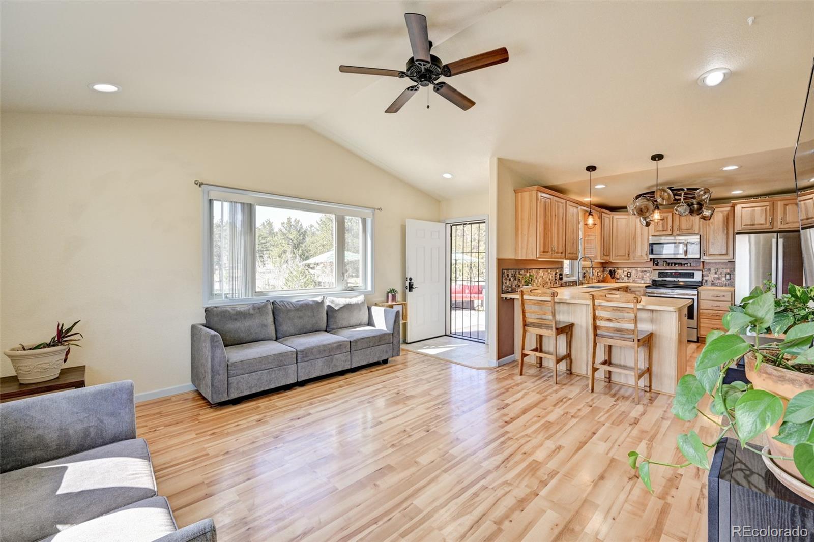 9473 Ranch Road Hartsel, CO 80449 - Photo 6 of 50 a living room with furniture and kitchen view