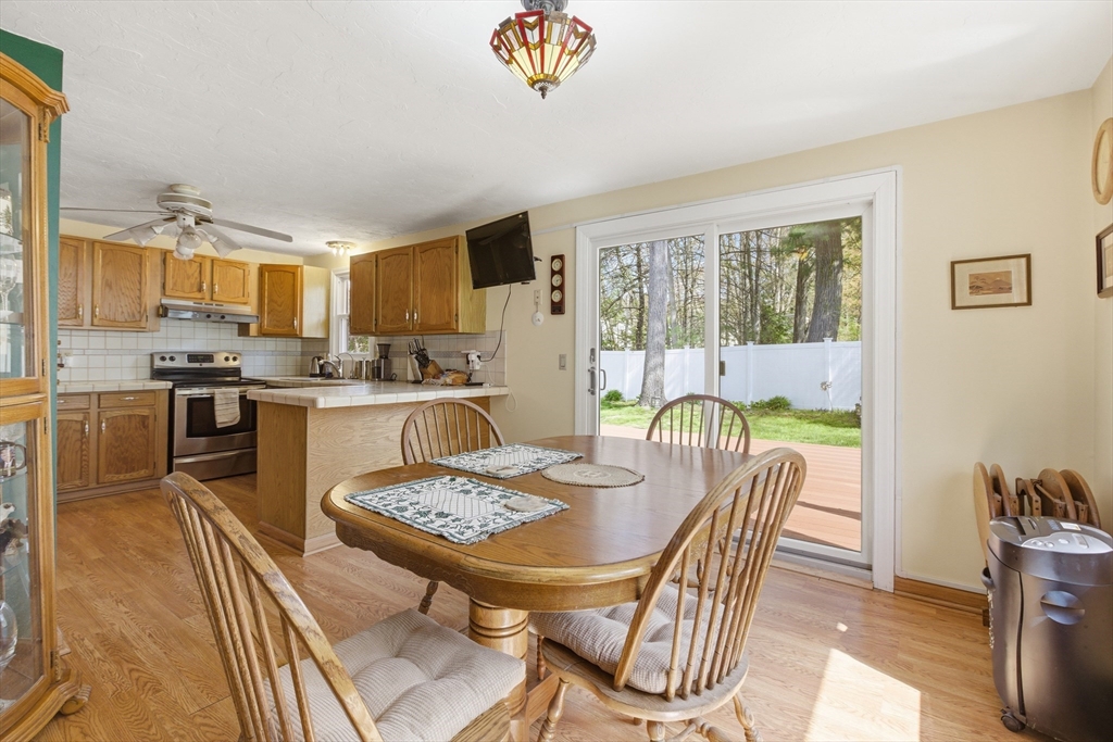 19 Mockingbird Lane Maynard, MA 01754 - Photo 7 of 34 a view of a dining room with furniture window and outside view