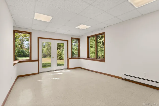 an empty room with windows