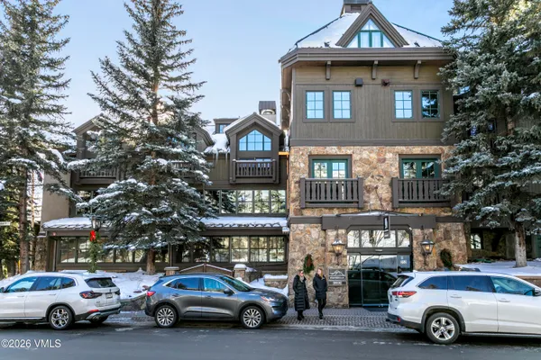 a car parked in front of a building