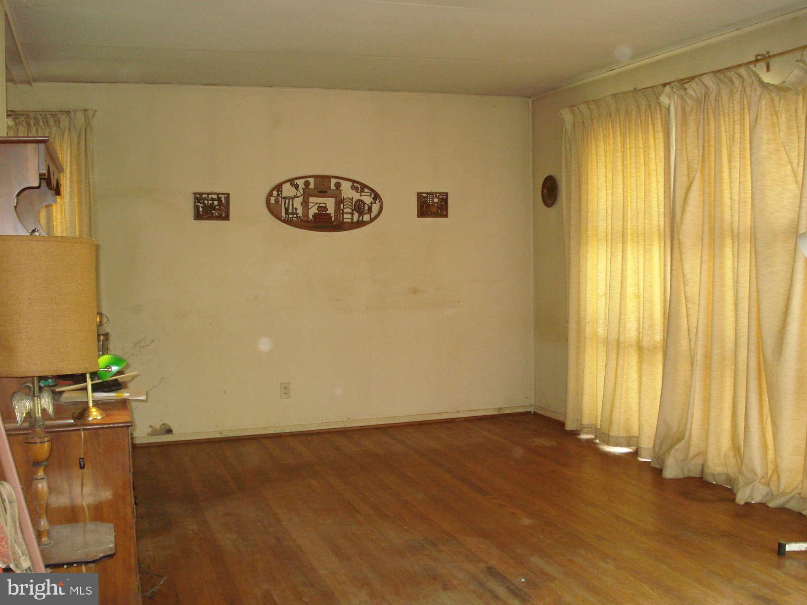 938 Rosedale Avenue Baltimore, MD 21237 - Photo 8 of 15 Living Room View 2