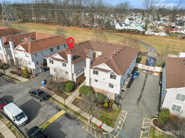 an aerial view of a house with lake view