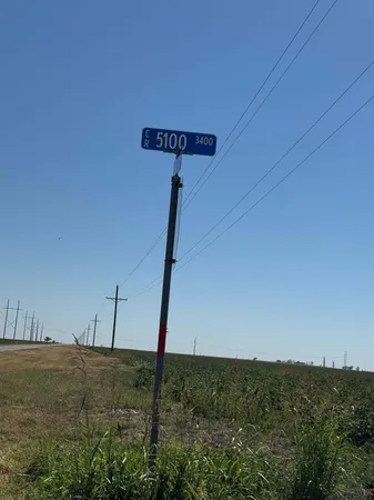 a stove top oven sitting inside of a kitchen