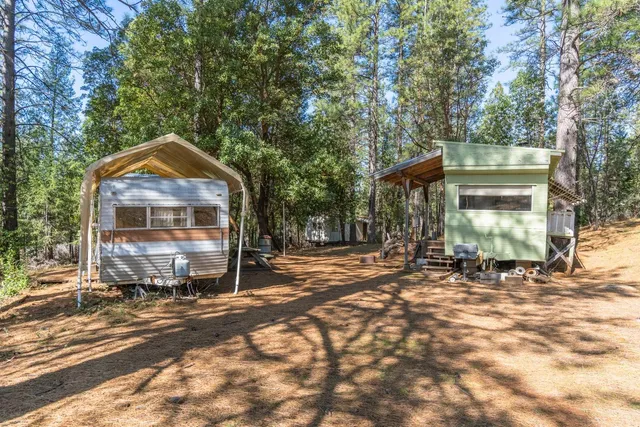 a view of a chair and table in the patio