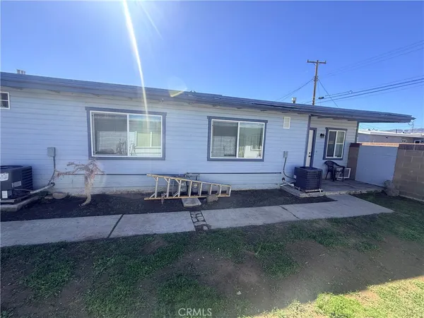 a front view of a house with patio