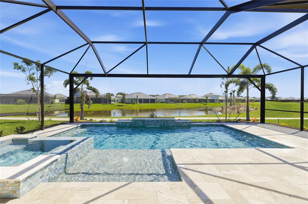 19156 Cherrystone Way Lakewood Ranch, FL 34211 - Photo 29 of 49 a view of a swimming pool with a yard