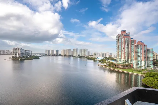 a view of a city skyline from a balcony
