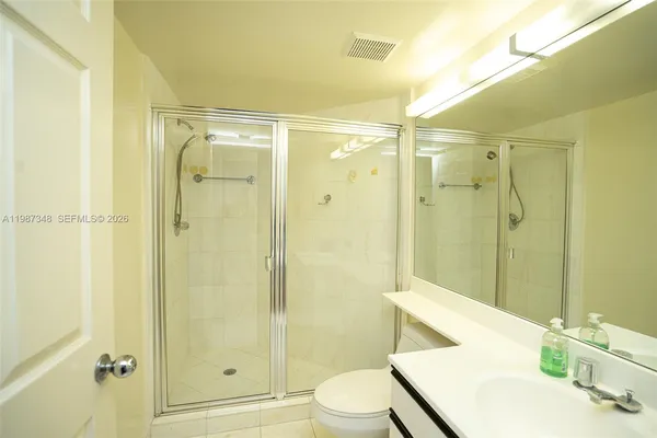 a view of storage and utility room with washer and dryer