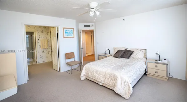 a bedroom with a bed and furniture
