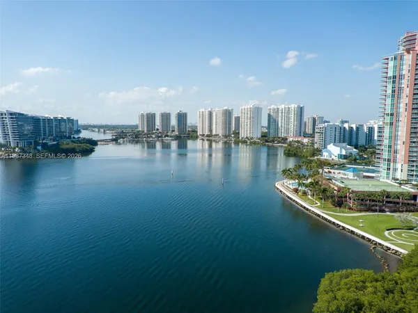 a view of a city with tall buildings