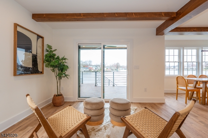 43 East Shore Road Denville, NJ 07834 - Photo 12 of 45 a living room with furniture and a potted plant
