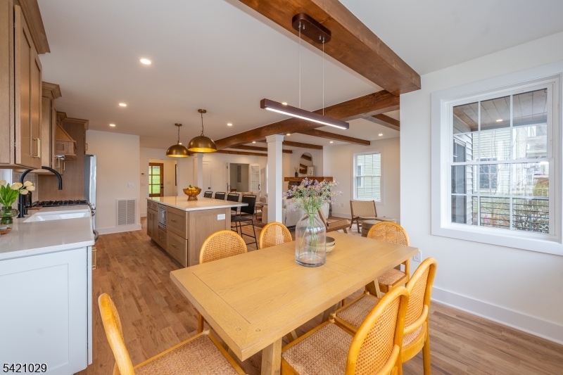 43 East Shore Road Denville, NJ 07834 - Photo 13 of 45 a view of a dining room with furniture and a large window