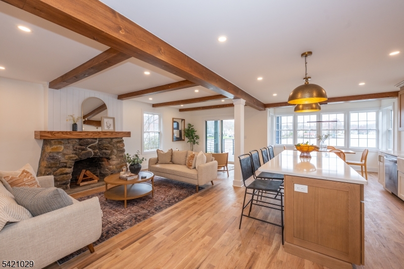 43 East Shore Road Denville, NJ 07834 - Photo 16 of 45 a living room with furniture fireplace and dining table