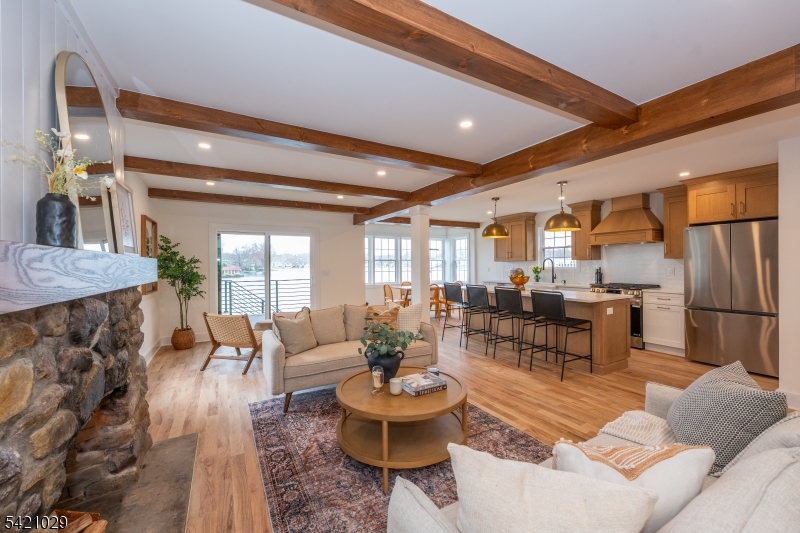 43 East Shore Road Denville, NJ 07834 - Photo 19 of 45 a living room with furniture and kitchen view