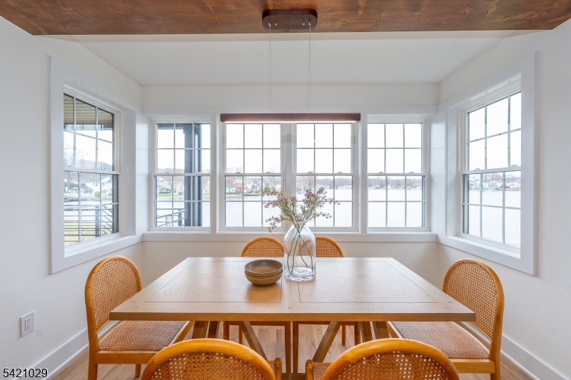 43 East Shore Road Denville, NJ 07834 - Photo 20 of 45 a view of a dining room with furniture window and outside view