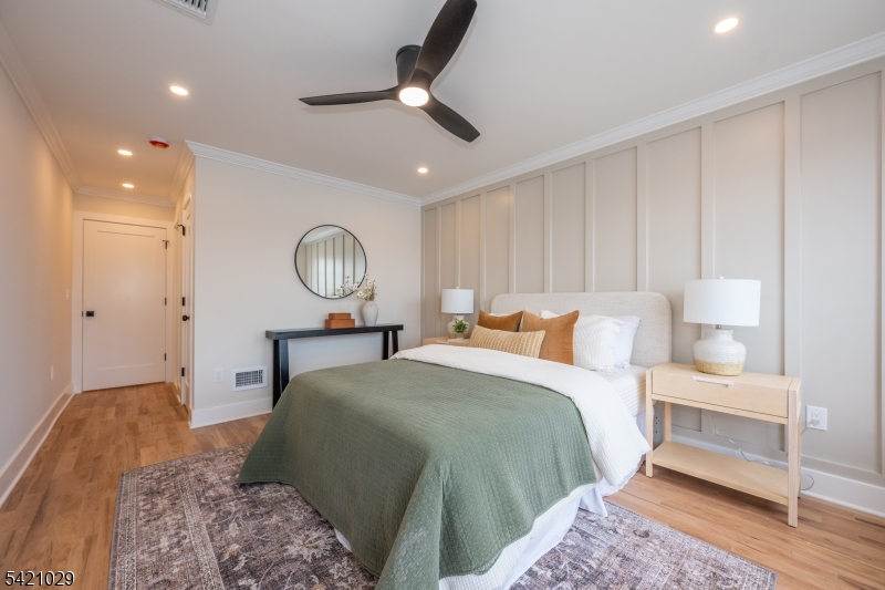 43 East Shore Road Denville, NJ 07834 - Photo 23 of 45 a bed room with a bed mirror and a window