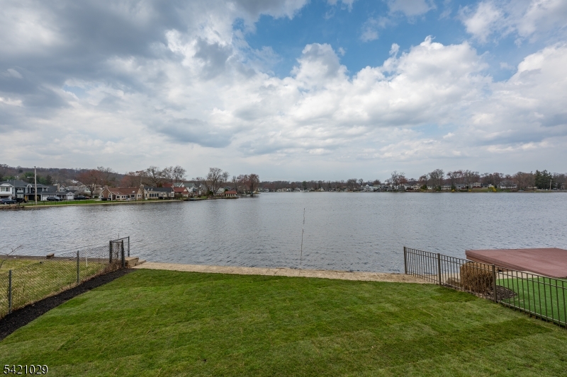 43 East Shore Road Denville, NJ 07834 - Photo 3 of 45 a view of a lake from a yard