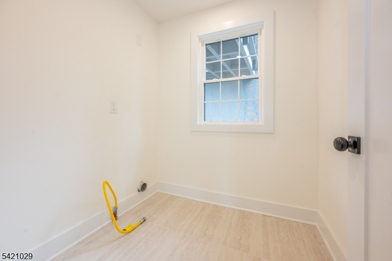 43 East Shore Road Denville, NJ 07834 - Photo 33 of 45 an empty room with a window