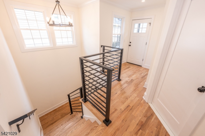 43 East Shore Road Denville, NJ 07834 - Photo 36 of 45 an entryway with wooden floor and windows